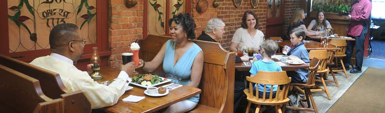 couple toasting drinks at dinner